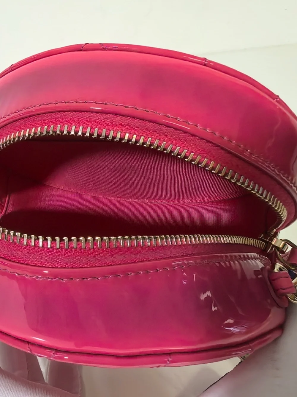 CHANEL Hot Pink Quilted Patent Leather Round Crossbody with Gold CC